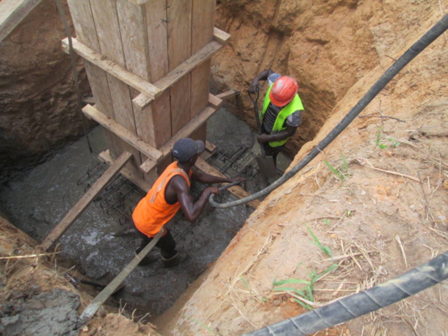 Concrete placement around tower foundation footing